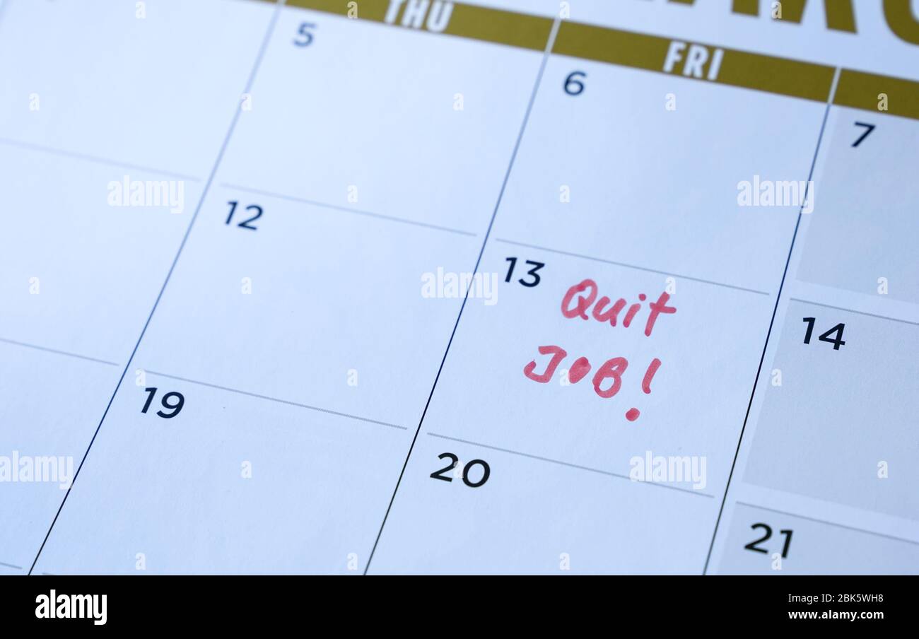 Chiudere le parole del lavoro scritte sul calendario della tabella con un indicatore rosso. Concetto di occupazione o di carriera. Foto Stock