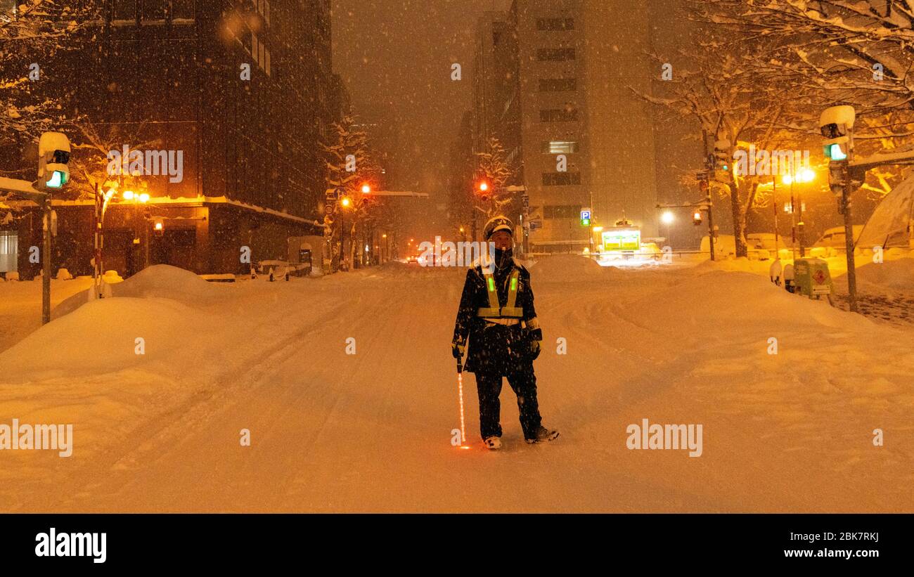 Traversata Guardia nella neve, Sapporo, Giappone Foto Stock