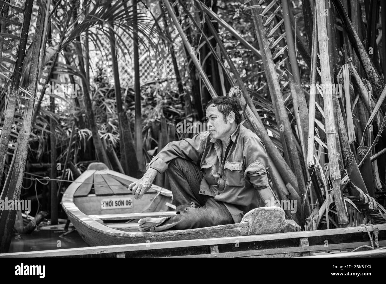 Mekong Delta boatman Foto Stock
