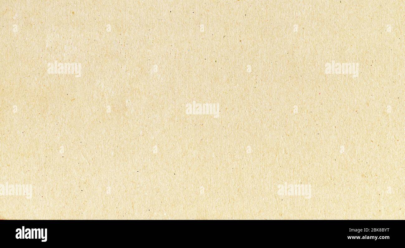 Uno sfondo fibroso di carte con un sacco di texture in crema beige Foto Stock