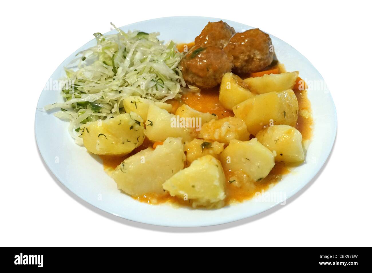 Polpette - maiale, manzo, patate e insalata sul piatto Foto Stock