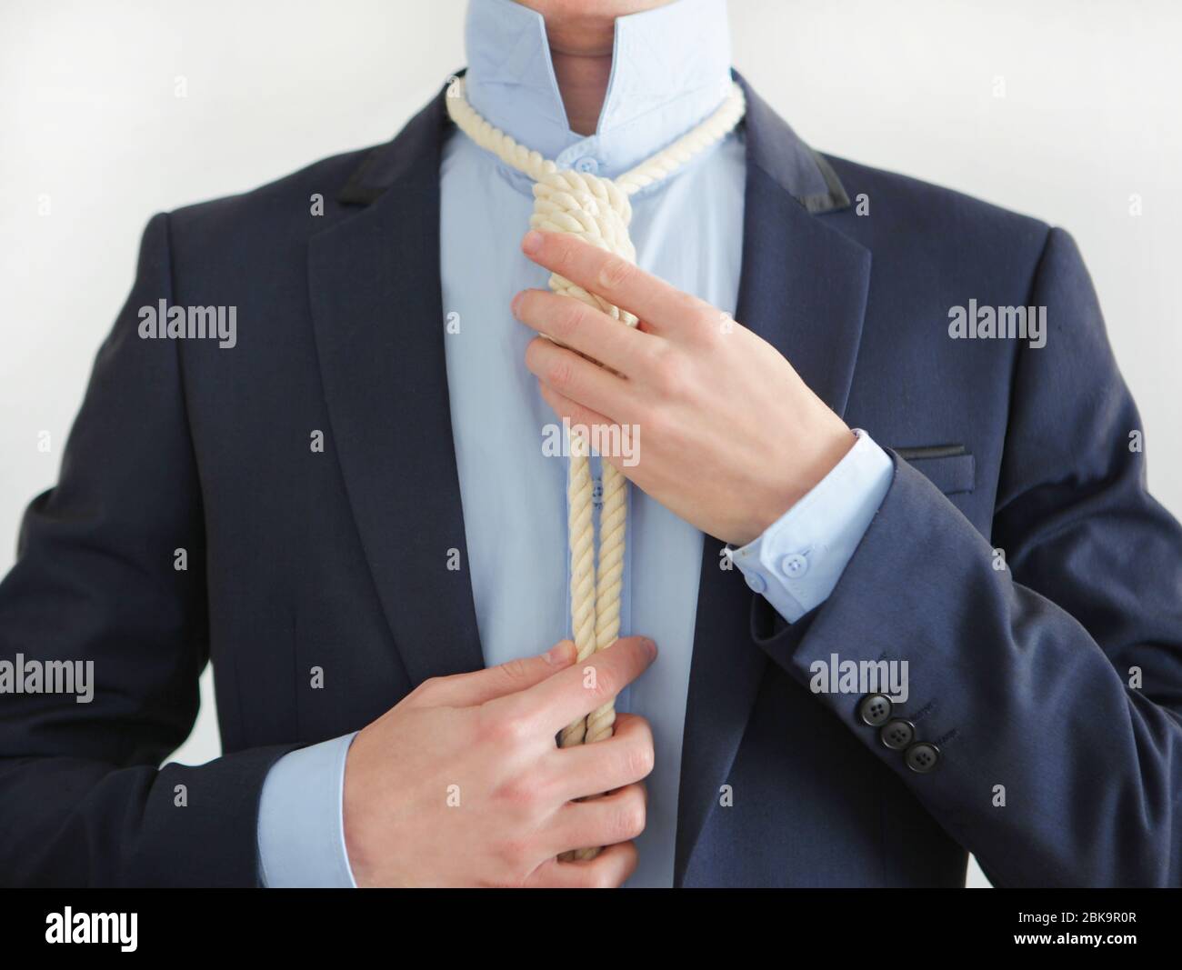 Cappio di hangman intorno al collo dell'uomo d'affari. Foto Stock