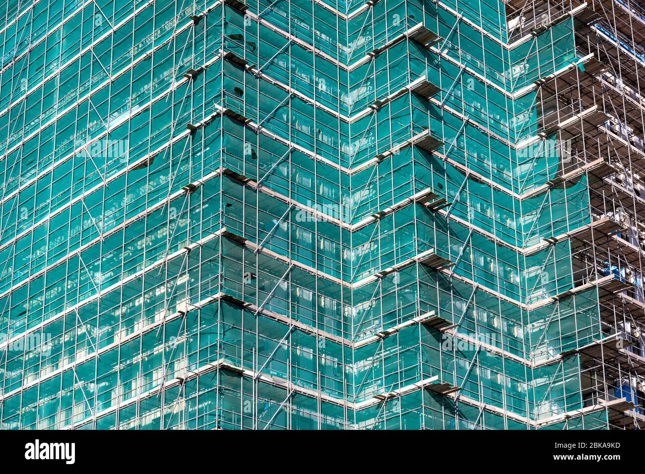 Ponteggio a edificio attualmente in costruzione Foto Stock