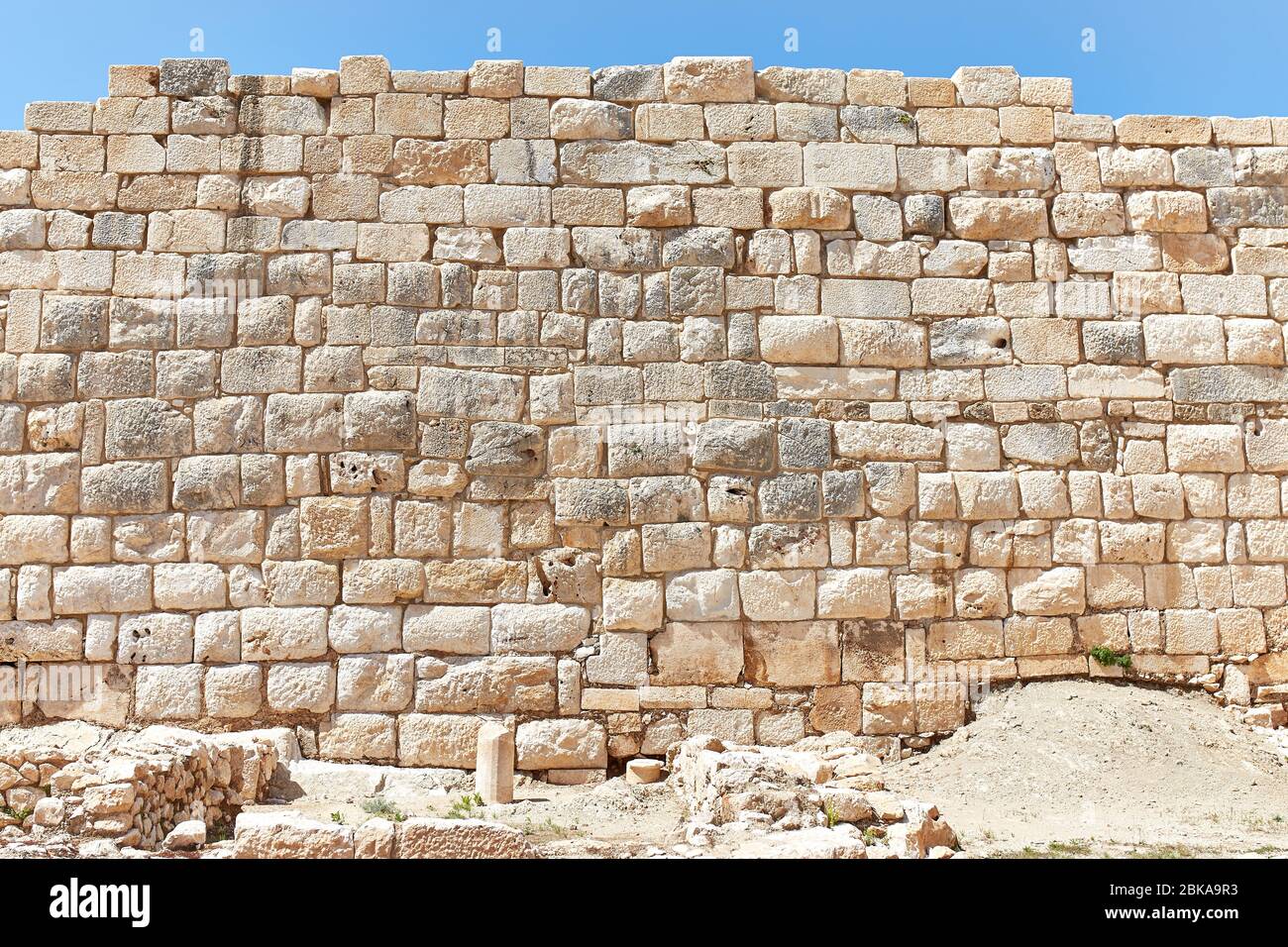 antico muro in mattoni di arenaria Foto Stock