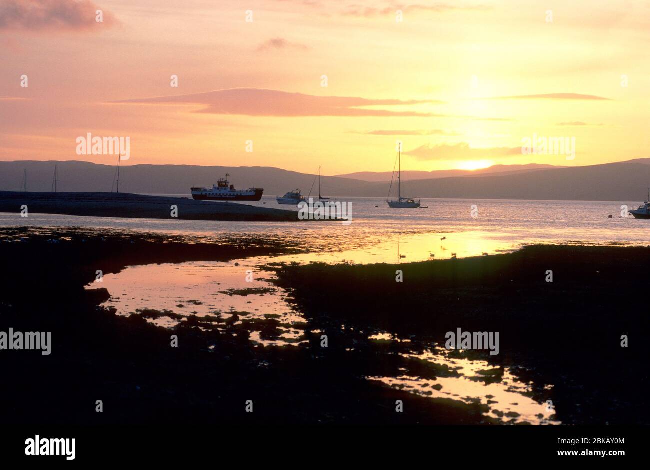 baia di lochranza al tramonto Foto Stock