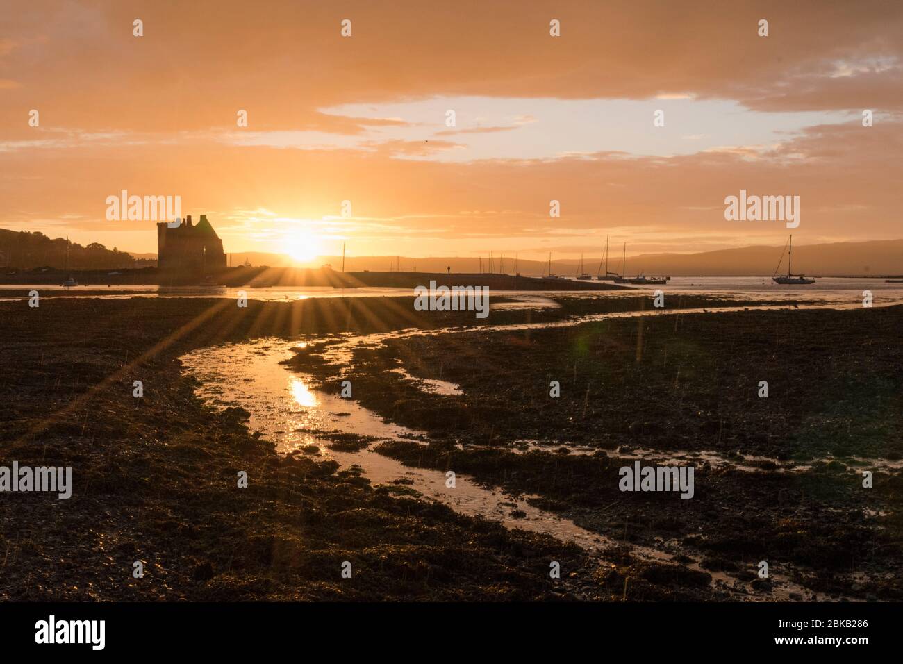 baia di lochranza al tramonto Foto Stock