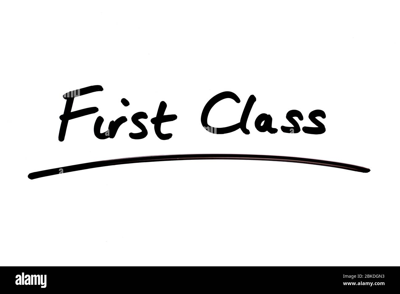 Prima Classe scritta a mano su sfondo bianco. Foto Stock