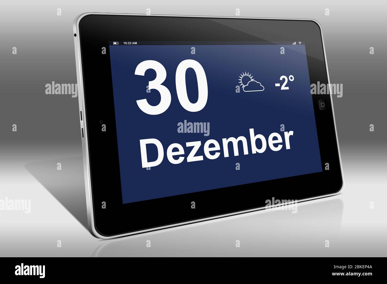 Un tablet visualizza un calendario in lingua tedesca con la data 30 dicembre | Ein Tablet-computer zeigt das Datum 30. Dicembre Foto Stock