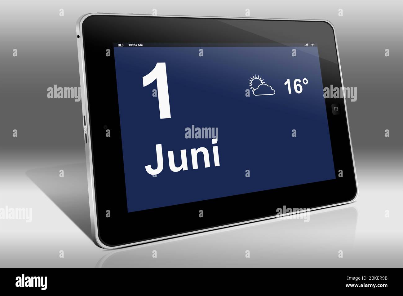 Un tablet visualizza un calendario in lingua tedesca con la data 1 giugno | Ein Tablet-computer zeigt das Datum 1. Juni Foto Stock