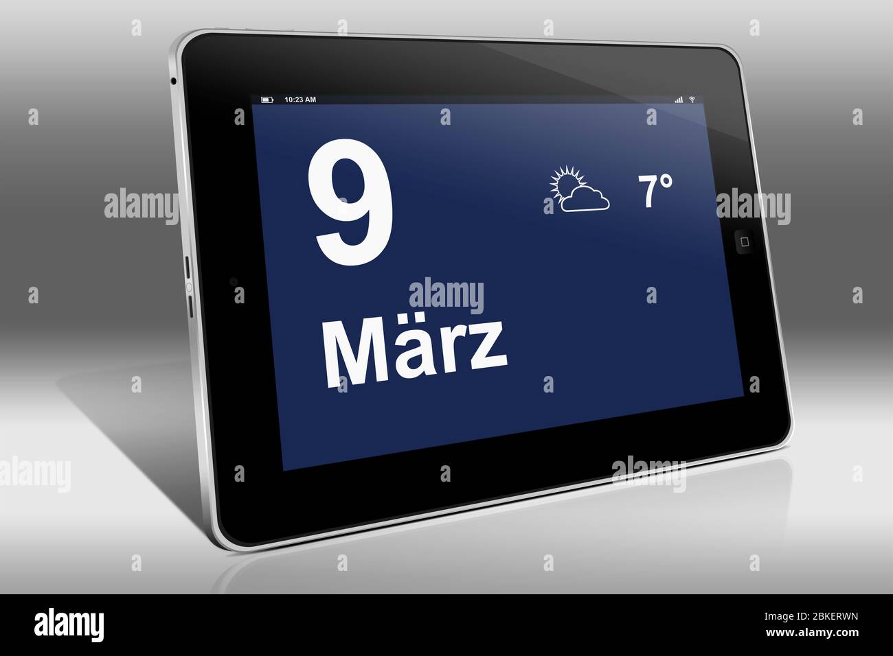 Un tablet visualizza un calendario in lingua tedesca con la data 9 marzo | Ein Tablet-computer zeigt das Datum 9. März Foto Stock