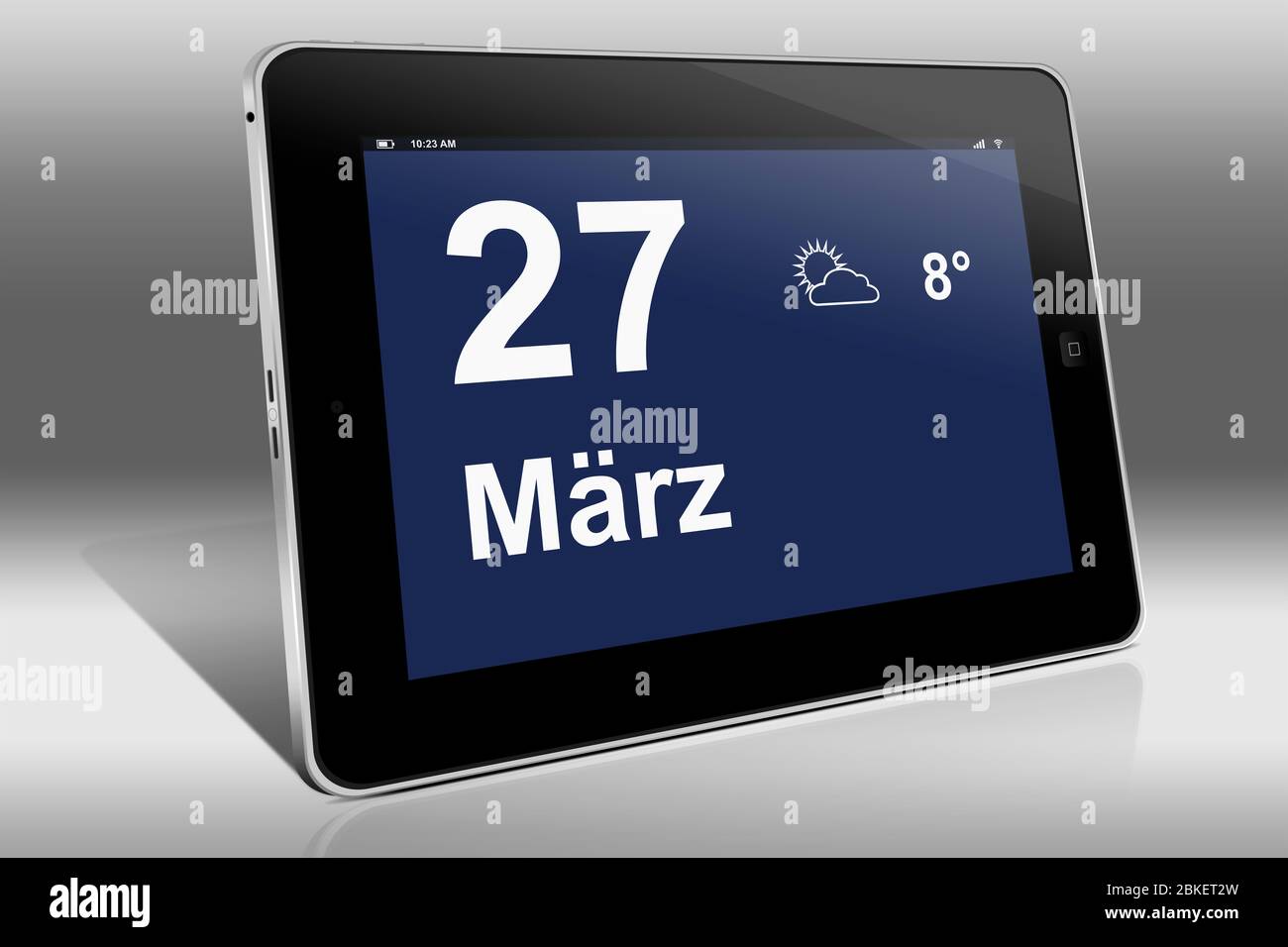 Un tablet visualizza un calendario in lingua tedesca con la data del 27 marzo | Ein Tablet-computer zeigt das Datum 27. März Foto Stock