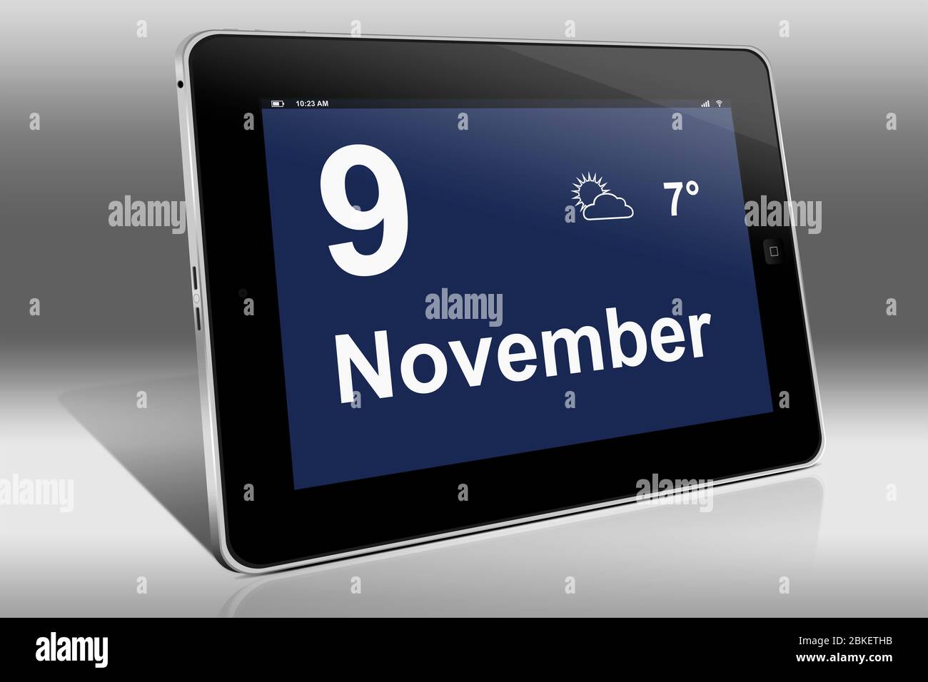 Un tablet visualizza un calendario in lingua tedesca con la data 9 novembre | Ein Tablet-computer zeigt das Datum 9. Novembre Foto Stock