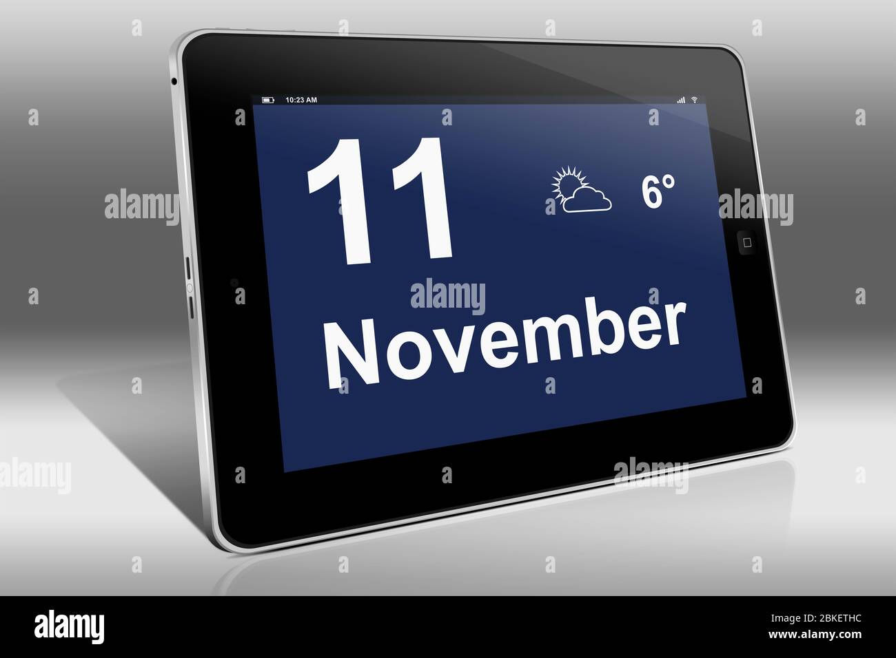 Un tablet visualizza un calendario in lingua tedesca con la data 11 novembre | Ein Tablet-computer zeigt das Datum 11. Novembre Foto Stock