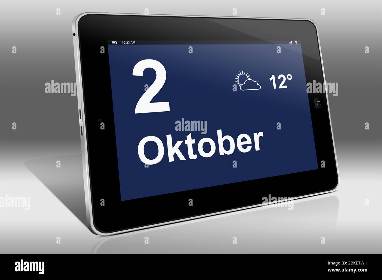 Un tablet visualizza un calendario in lingua tedesca con la data del 2 ottobre | Ein Tablet-computer zeigt das Datum 2. Oktober Foto Stock
