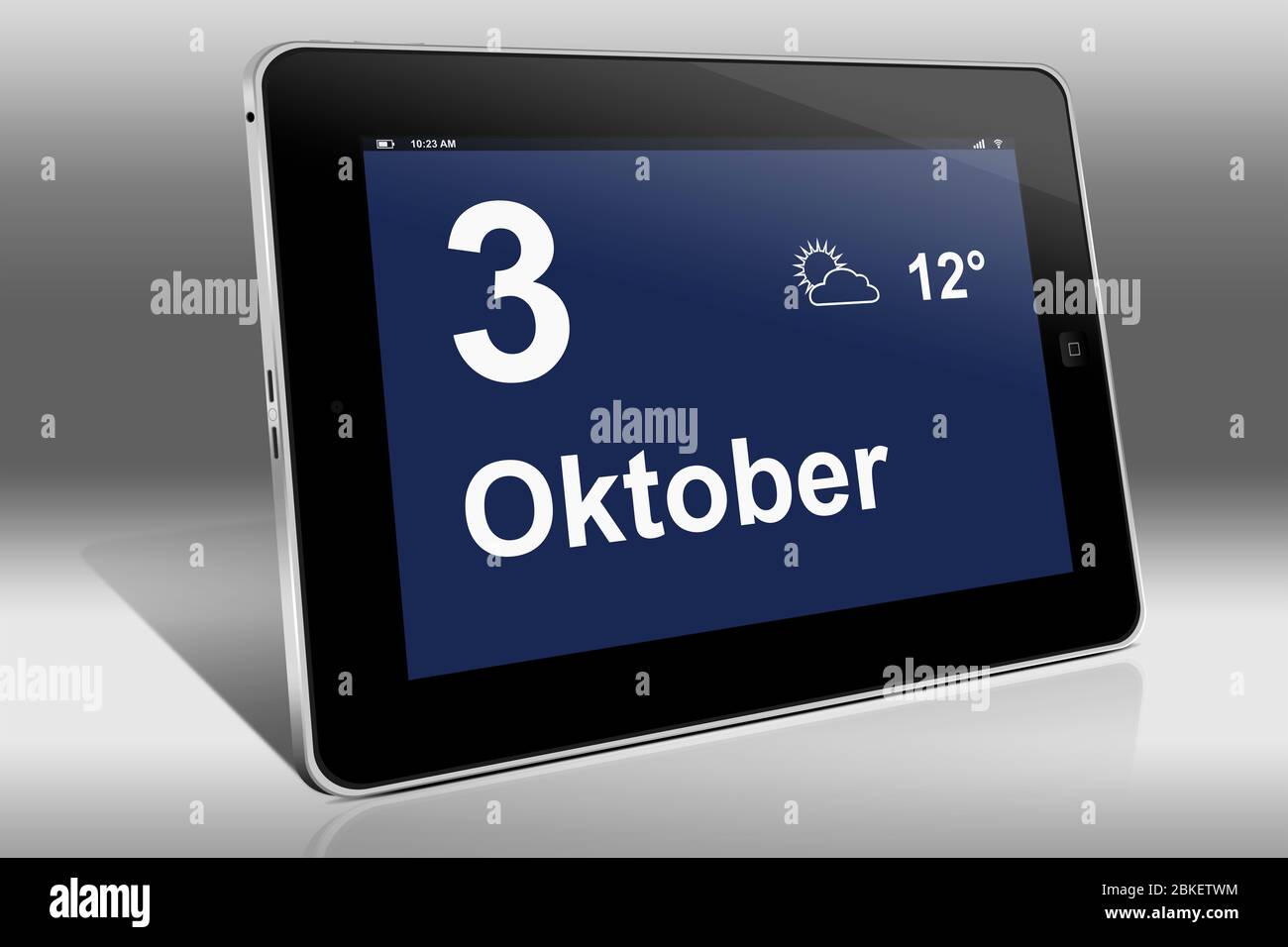Un tablet visualizza un calendario in lingua tedesca con la data 3 ottobre | Ein Tablet-computer zeigt das Datum 3. Oktober Foto Stock