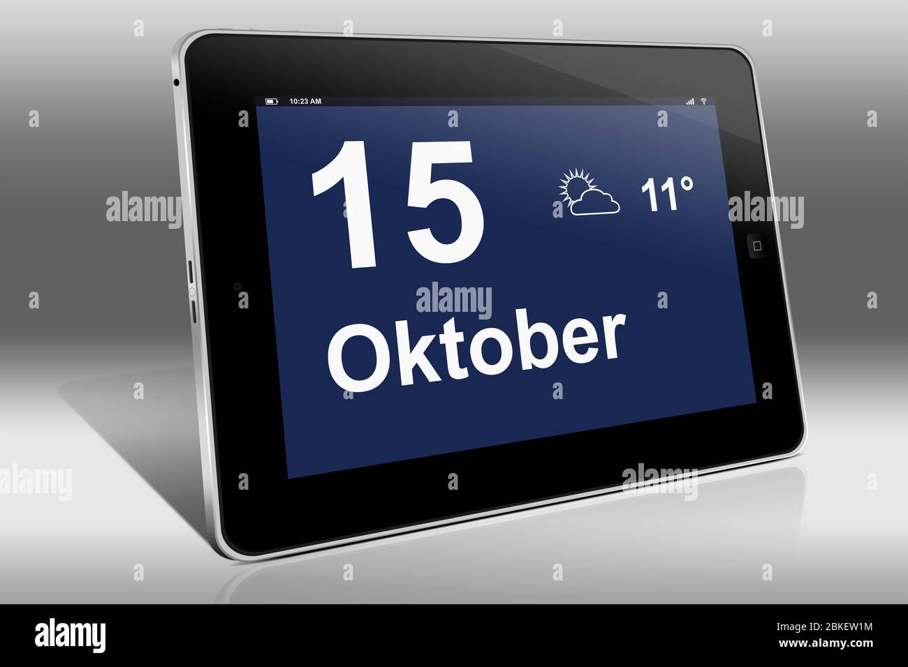 Un tablet visualizza un calendario in lingua tedesca con la data 15 ottobre | Ein Tablet-computer zeigt das Datum 15. Oktober Foto Stock
