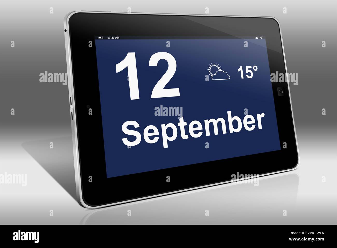 Un tablet visualizza un calendario in lingua tedesca con la data 12 settembre | Ein Tablet-computer zeigt das Datum 12. Settembre Foto Stock