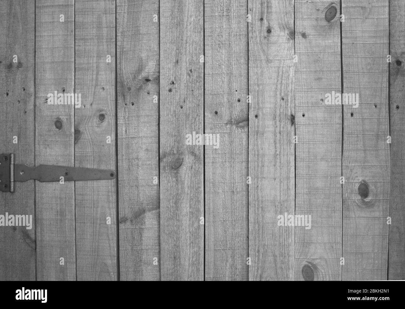 Struttura in legno grigio in recinzione viilage. Orizzontale Foto Stock