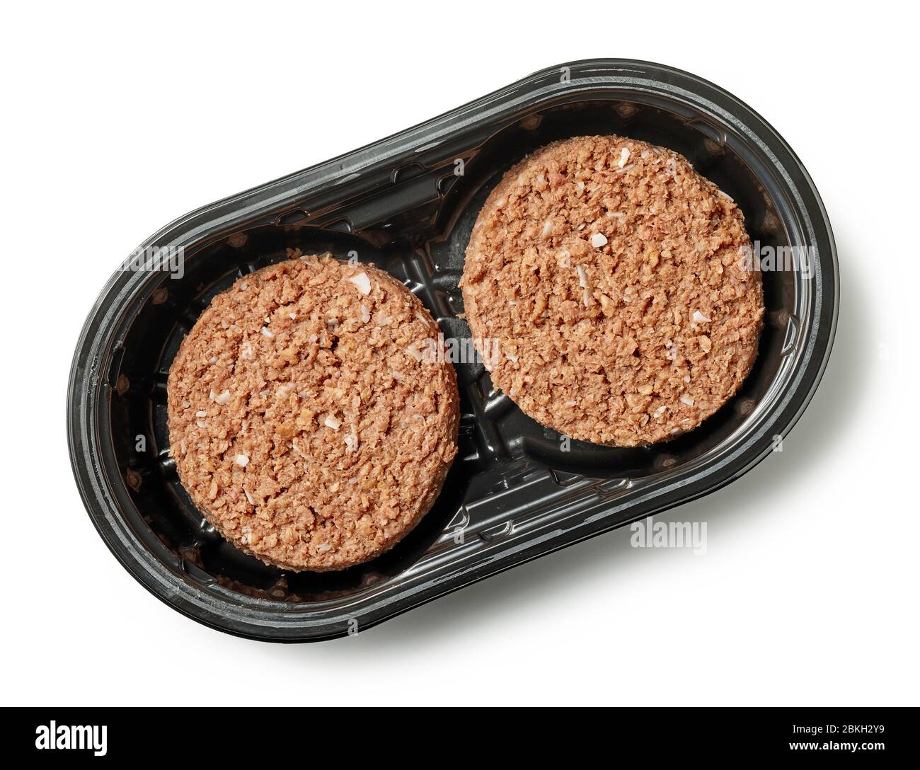 Carne vegana a base di piante crude con erbe aromatiche. Sfondo nero. Vista  dall'alto Foto stock - Alamy