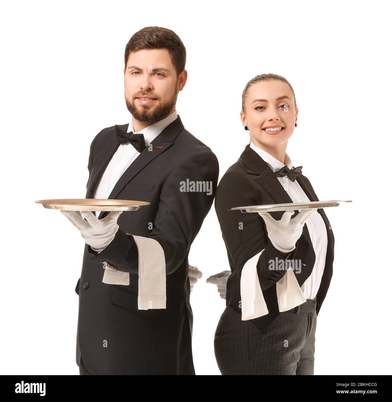 Camerieri maschi e femmine su sfondo bianco Foto Stock