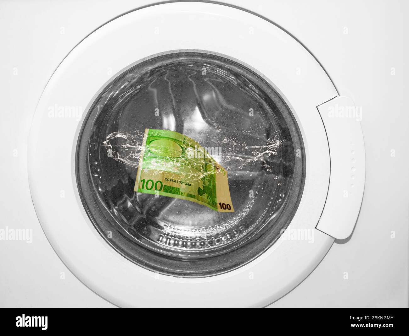 pulizia denaro in lavatrice - simbolo per il crimine finanziario Foto Stock