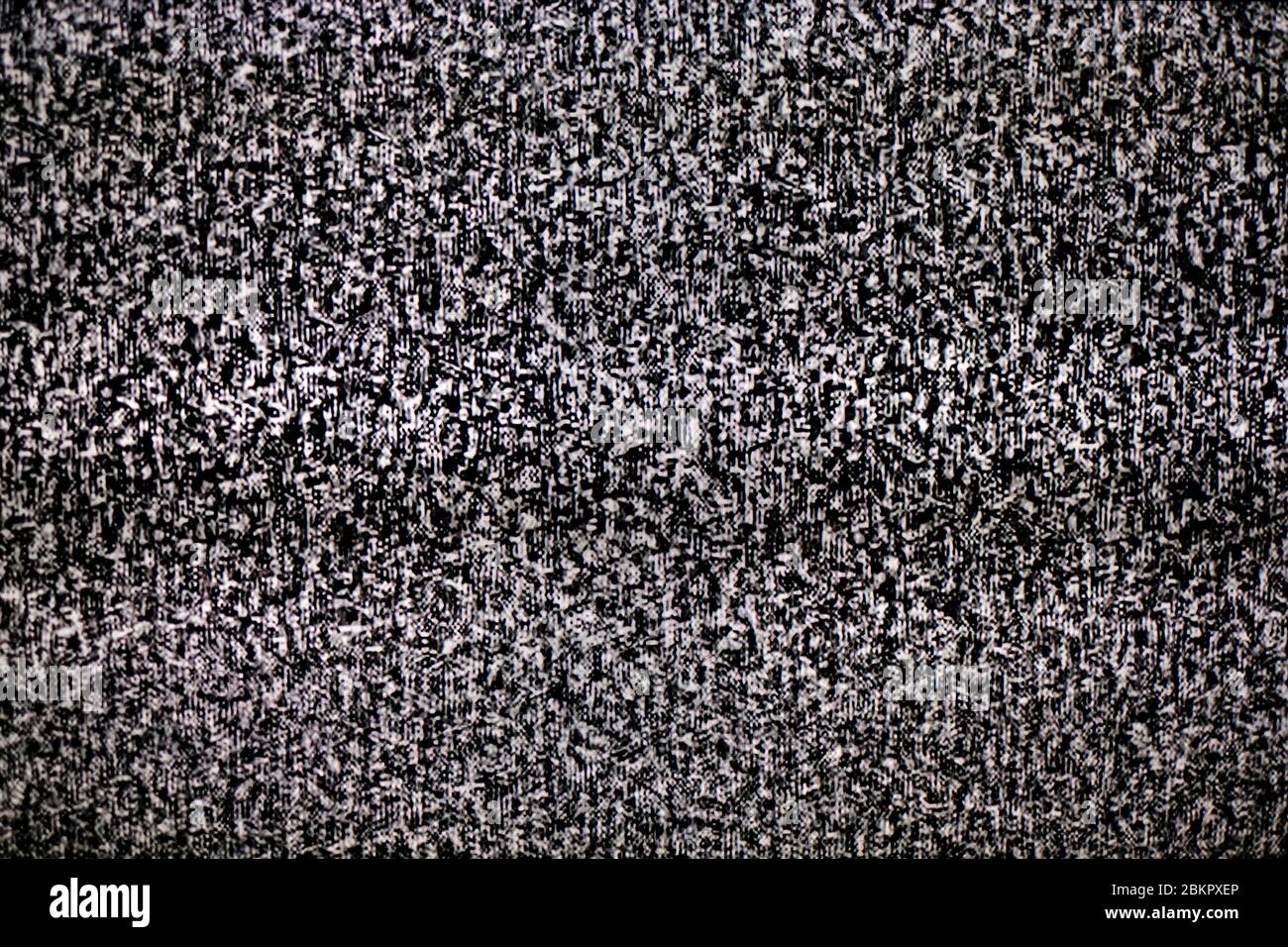 Assenza di segnale sul monitor del televisore, rumore statico TV bianco e nero scadente Foto Stock