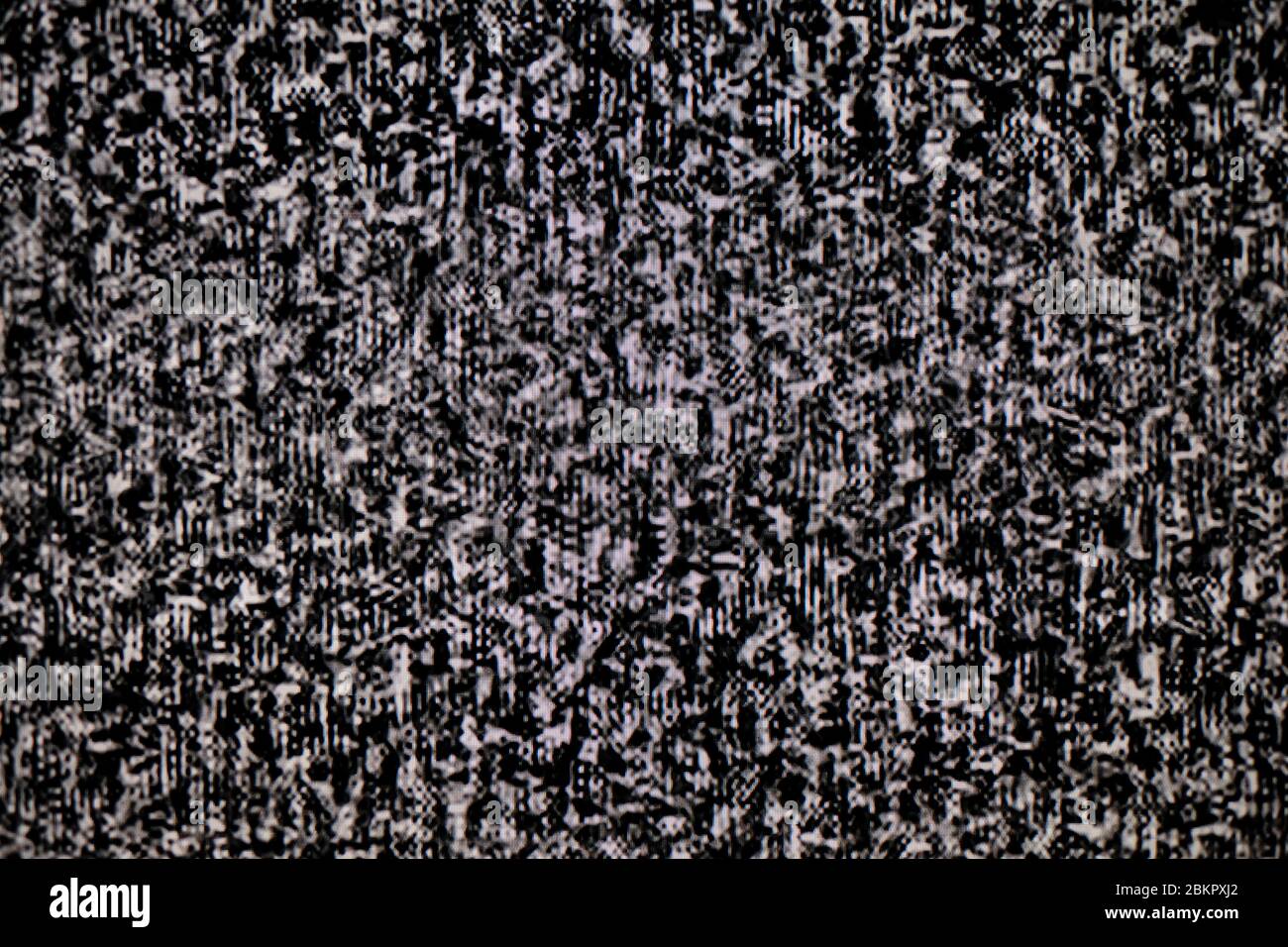 Assenza di segnale sul monitor del televisore, rumore statico TV bianco e nero scadente Foto Stock