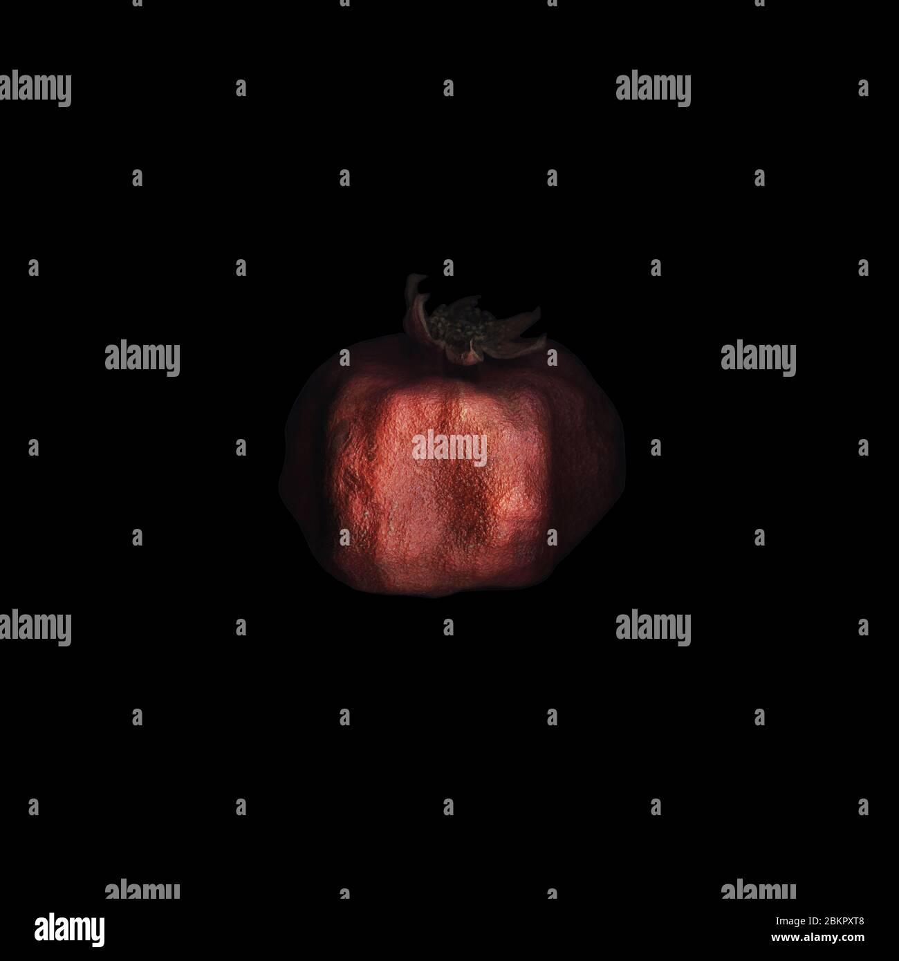 Melograno su fondo nero. Primo piano melograno secco rosso isolato su fondo quadrato nero. Foto filosofica e artistica. L'immagine Foto Stock