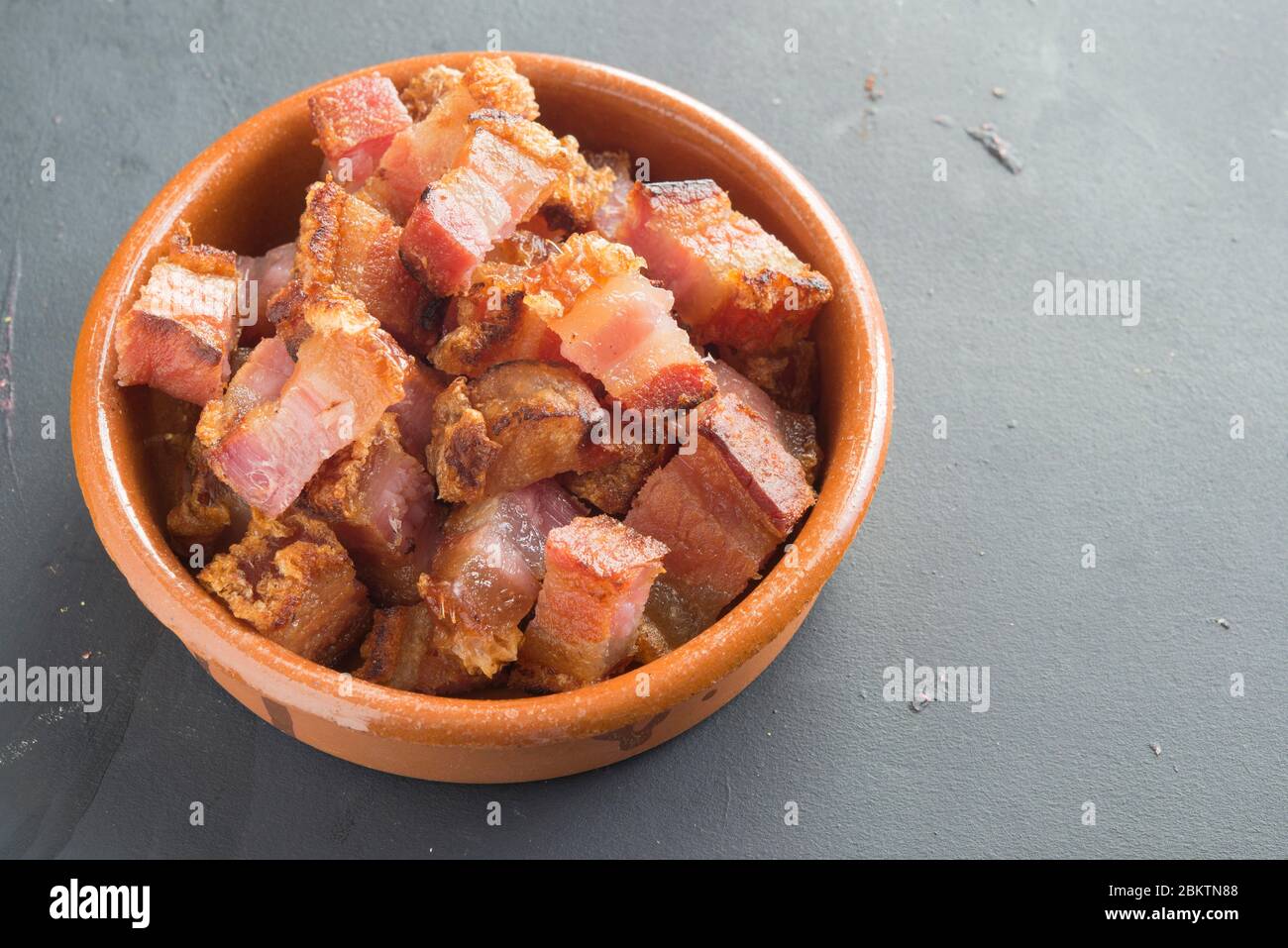 fetta di tapa di pancetta tipica cucina spagnola Foto Stock