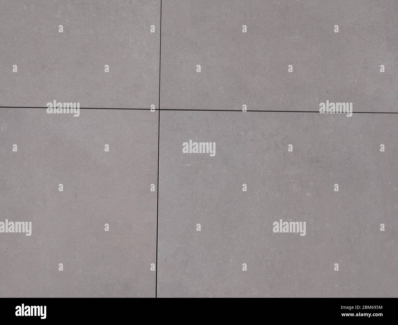 esterno grigio pietra blocco piastrelle pavimento grigio sfondo texture pattern Foto Stock