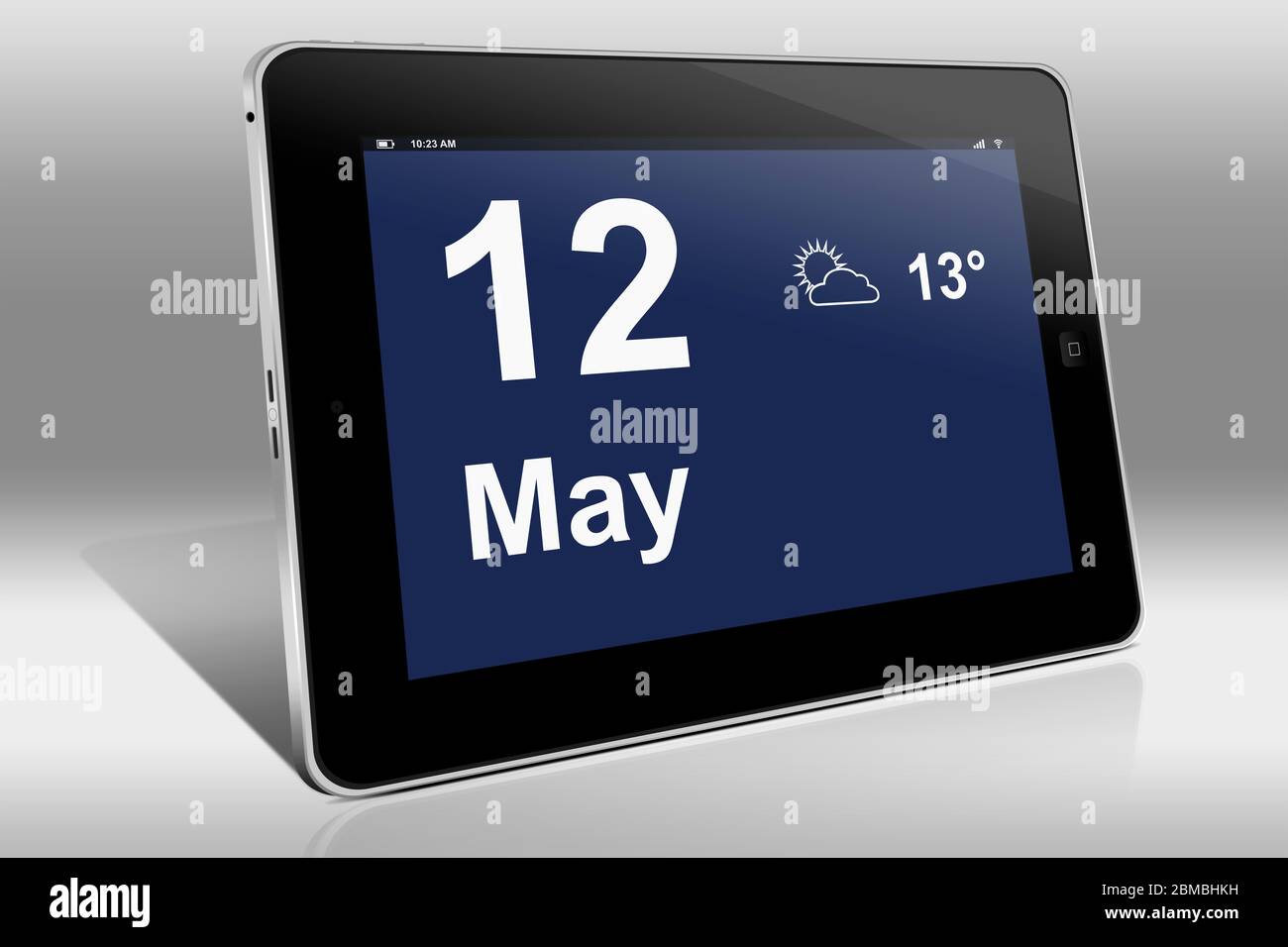 Un tablet visualizza un calendario in lingua inglese con la data 12 maggio | Ein Tablet-computer zeigt in Englischer Sprache den 12. Mai Foto Stock