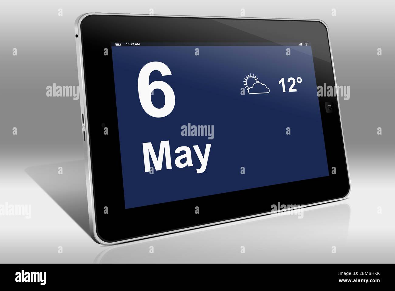Un tablet visualizza un calendario in lingua inglese con la data 6 maggio | Ein Tablet-computer zeigt in Englischer Sprache den 6. Mai Foto Stock