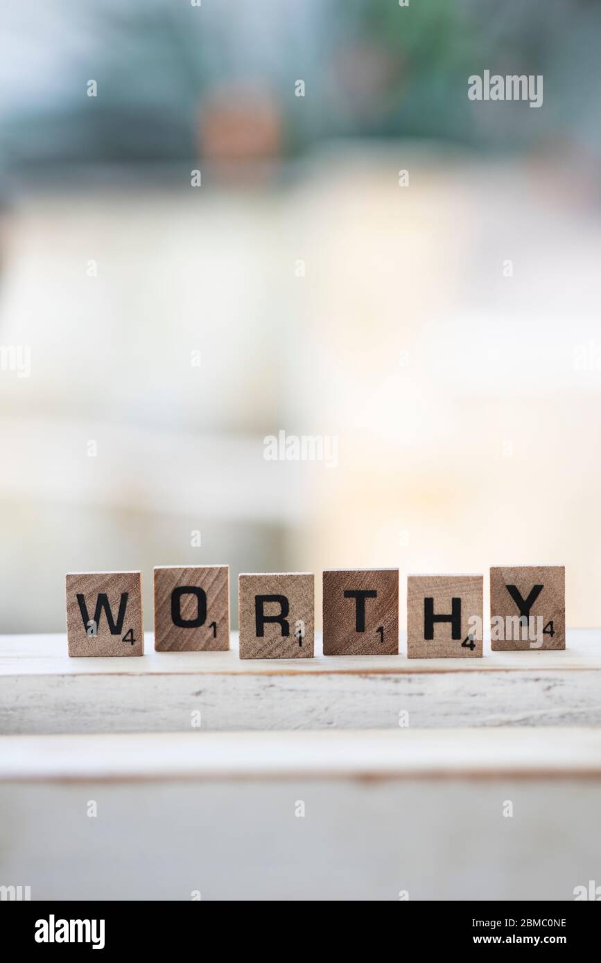 Degno in lettere a stampatello Foto Stock