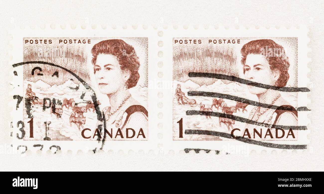 SEATTLE WASHINGTON - 8 maggio 2020: Inciso 1967 Queen Elizabeth finnitive timbro con cani e slitta e l'aurora boreale. Scott n. 454 Foto Stock