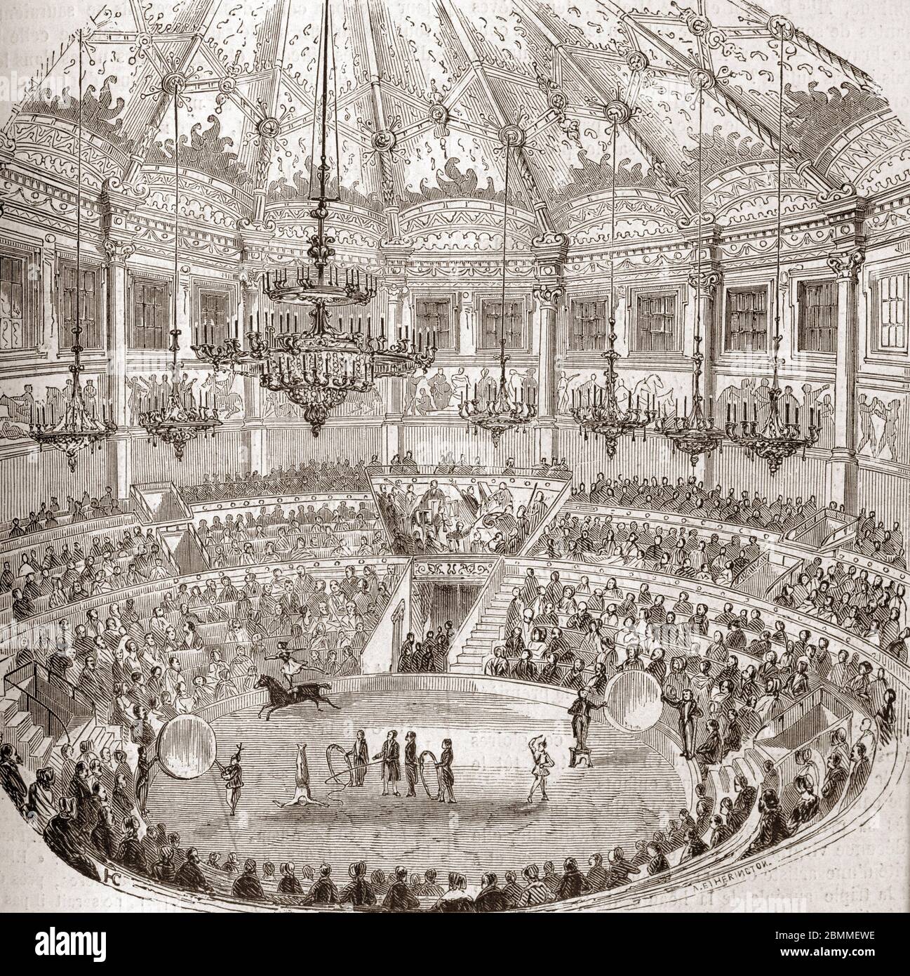 Monuments de Paris : vue d'un specacle de cirque avec des dresseurs de chevaux au cirque Napoleon (cirque-Napoleon puis cirque d'Hiver) a Paris, 1855 Foto Stock