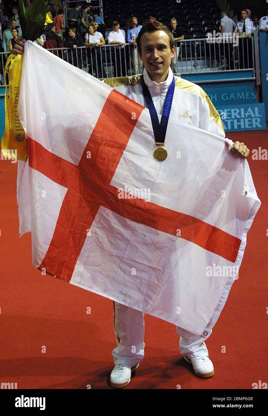 MANCHESTER - 30 LUGLIO: James Anderson d'Inghilterra celebra dopo aver vinto l'oro nel badmington degli uomini durante i Giochi del Commonwealth 2002, Manchester, Foto Stock