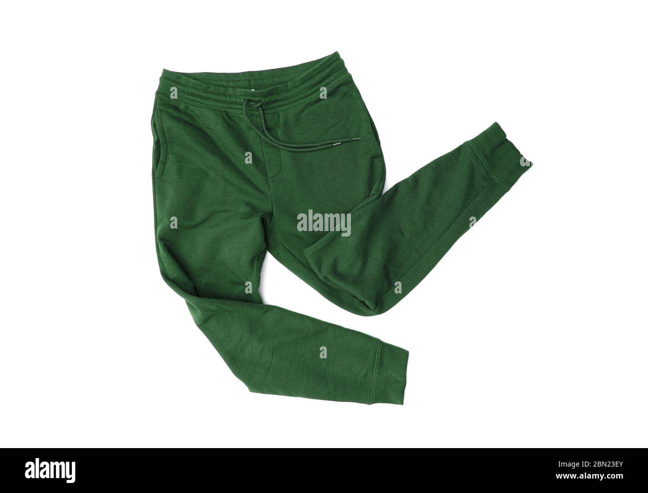 Pantaloni sportivi verdi, pantaloni da jogging, da uomo isolati su sfondo bianco Foto Stock