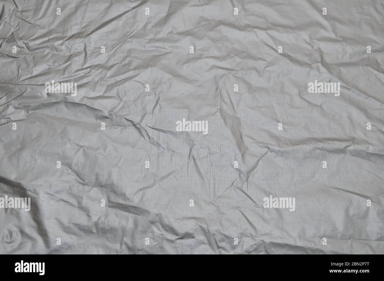 Pellicola di plastica nera. Sfondo, trama. Vuoto per i progettisti. Foto Stock