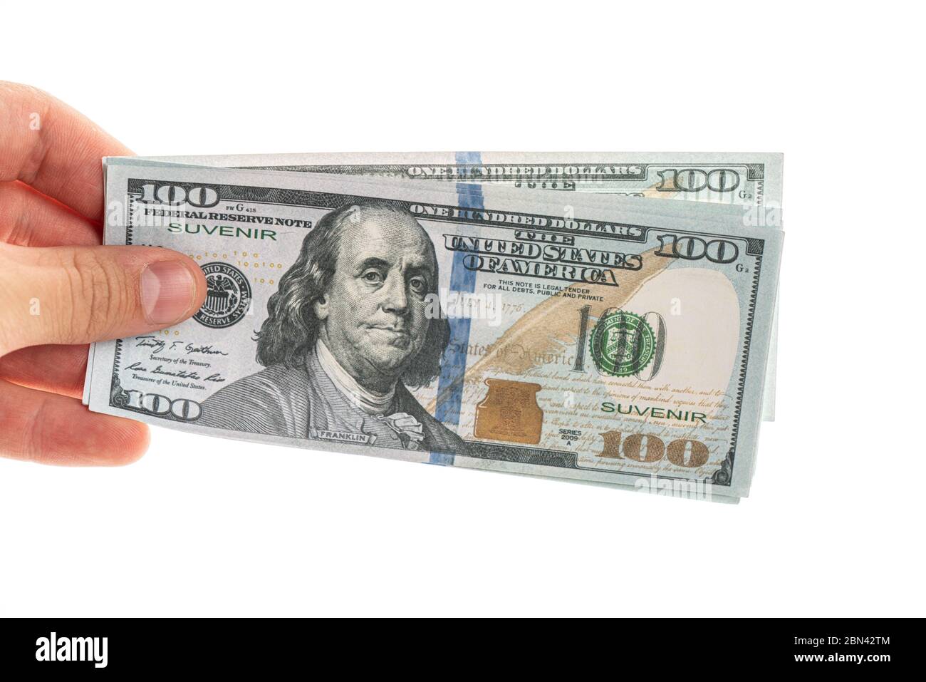 Closeup mano maschile dando soldi o pagando per qualcosa. Concetto commerciale e finanziario. Foto Stock