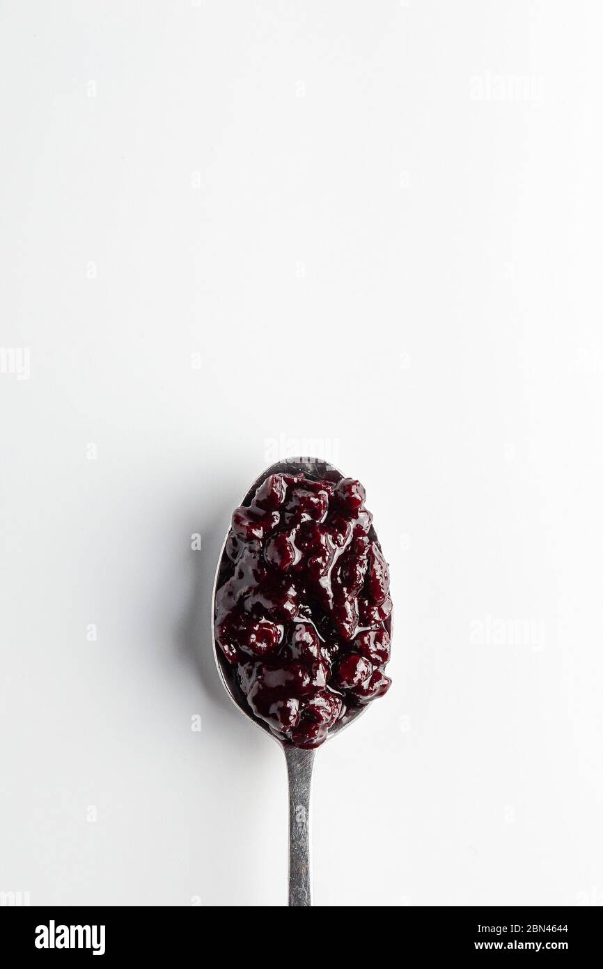 Composta di mirtillo su un cucchiaio Foto Stock