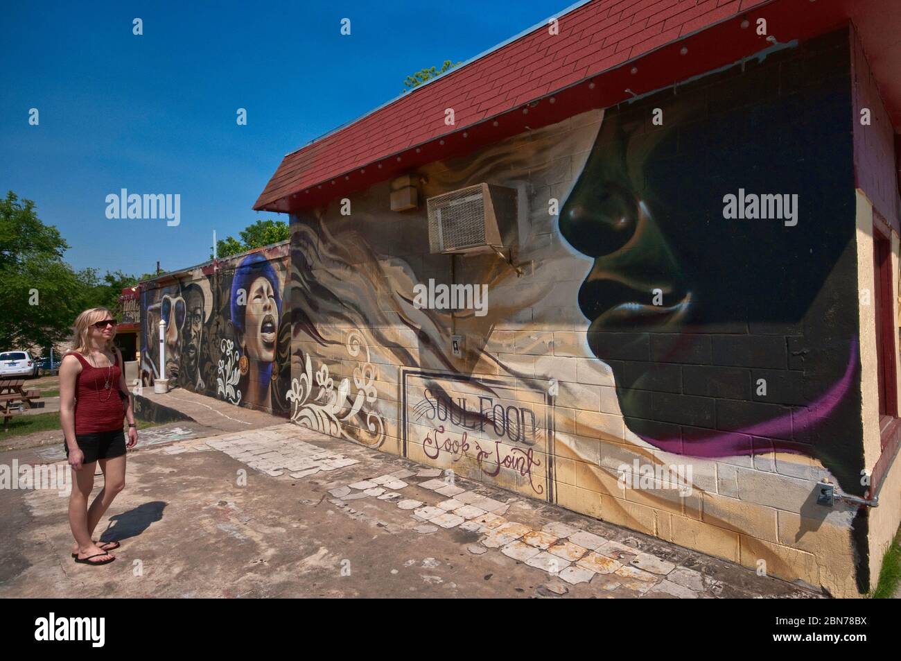 Mural al ristorante Soul Food a East 11th Street ad Austin, Texas, USA Foto Stock