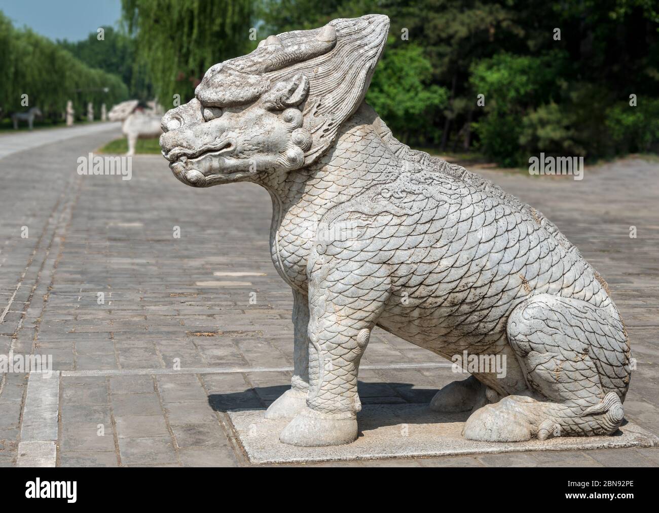 Seduto Qilin (animale Divino), Via Sacra, Tombe Ming, vicino a Pechino Foto Stock
