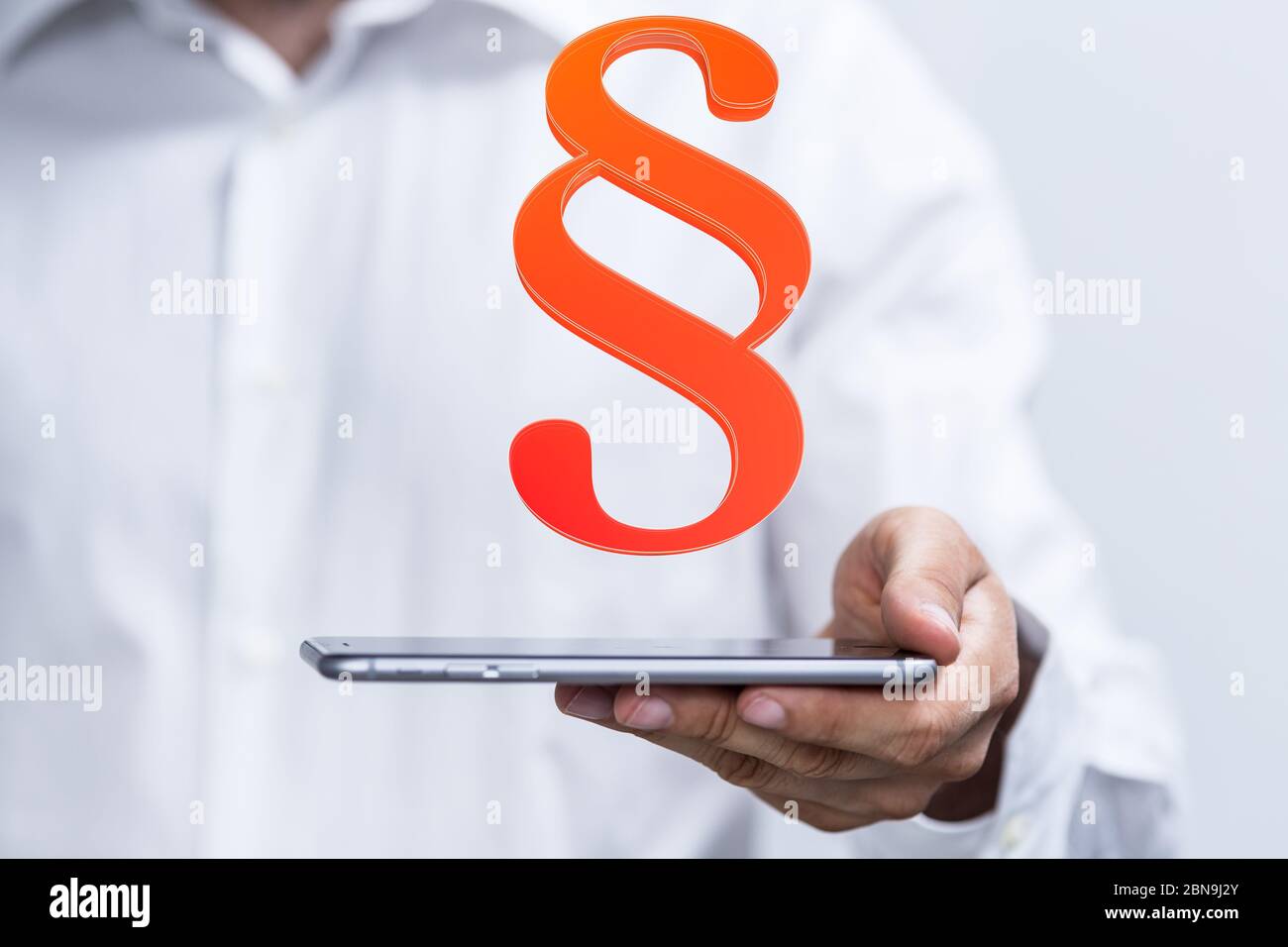 Un simbolo paragrafo legge segno digitale in mano Foto Stock Un simbolo paragrafo legge segno digitale in mano Foto Stock