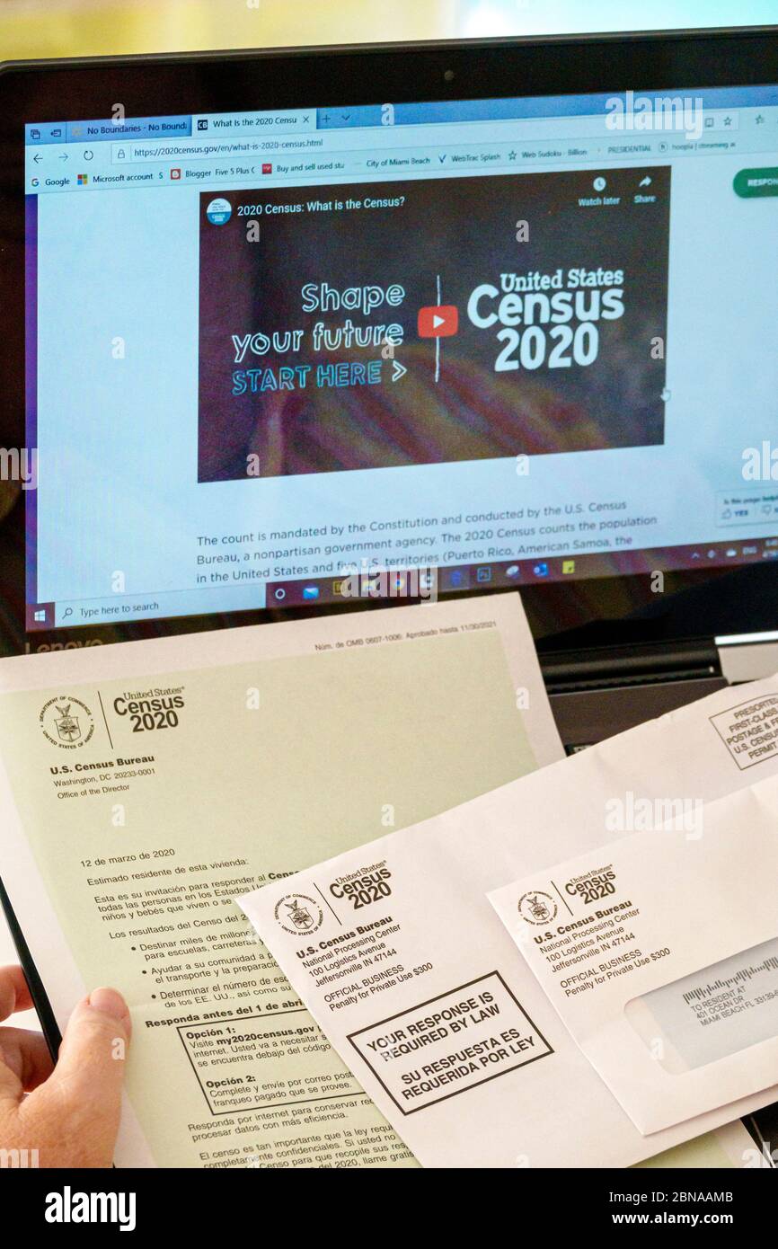 Miami Beach Florida,North Beach,sito web,tenuta di mano,schermo,censimento 2020,moduli lettera,schermo computer portatile,FL200415041 Foto Stock