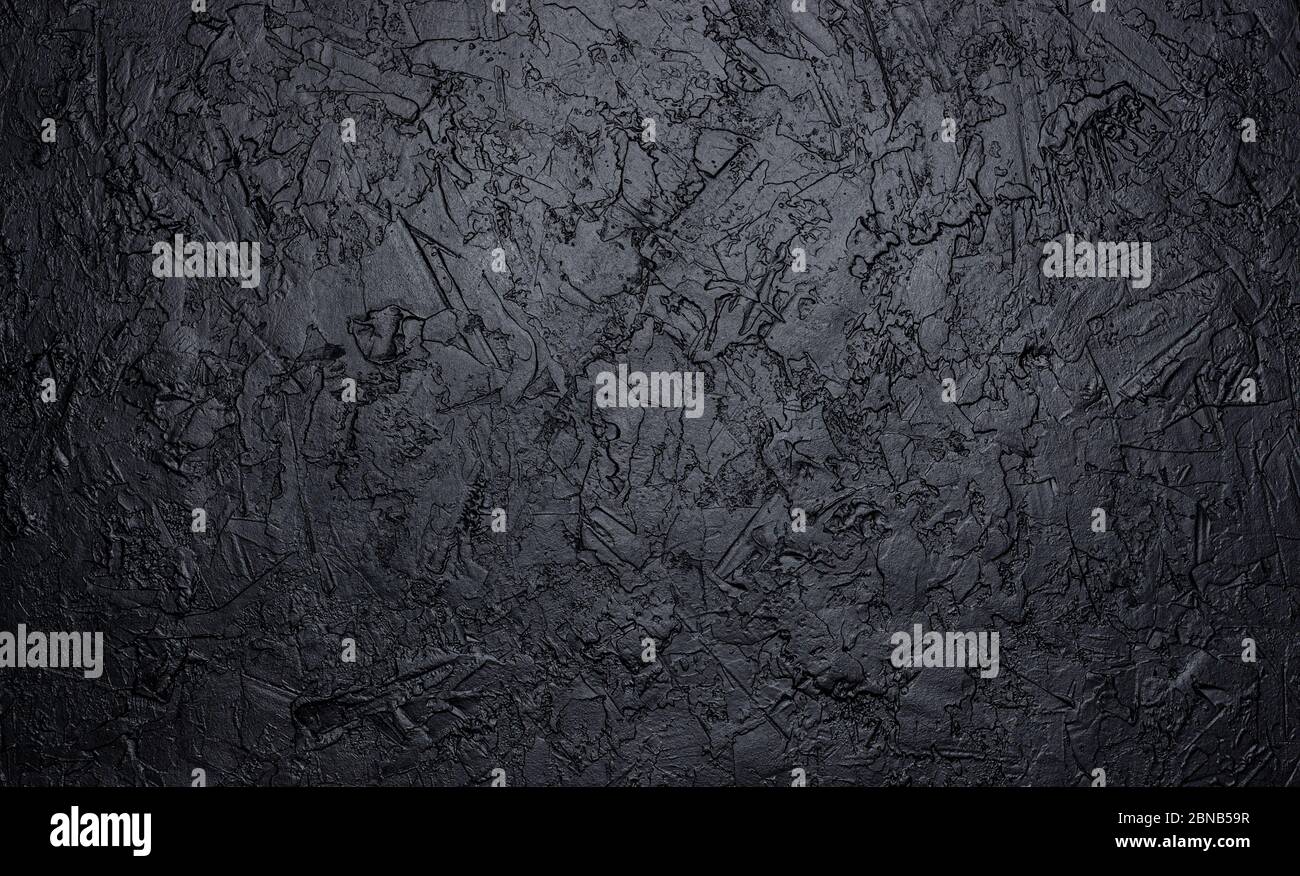 Struttura in pietra nera, sfondo in ardesia scura Foto Stock