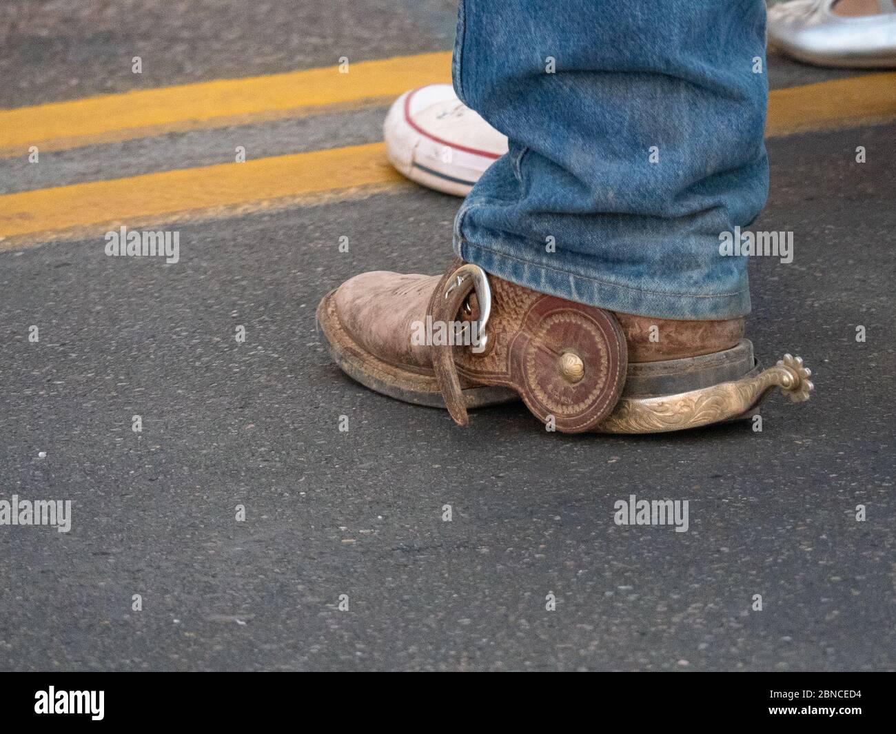 Stivali da cowboy con speroni. Foto Stock