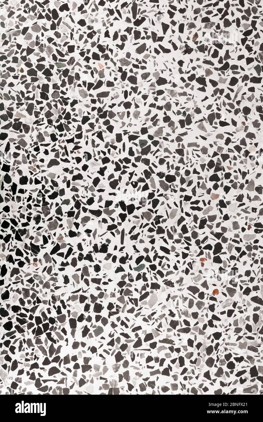pavimento terrazzo texture motivo pietra lucida parete e colore vecchio marmo di superficie per immagine di sfondo verticale Foto Stock