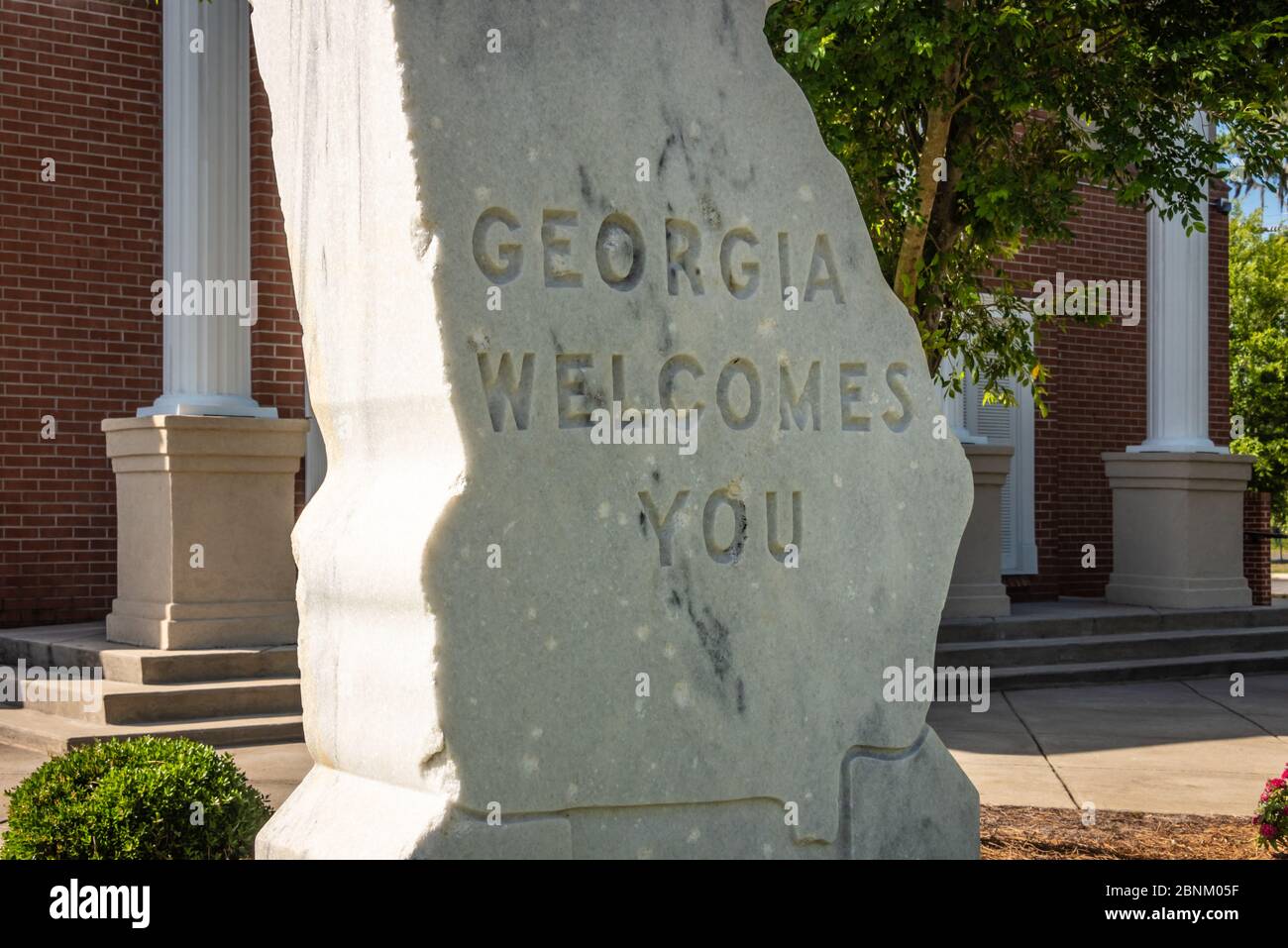 Il cartello in marmo 'Georgia vi dà il benvenuto' al Georgia Welcome Centre lungo la i-75 vicino alla linea di stato della Florida/Georgia. (STATI UNITI) Foto Stock
