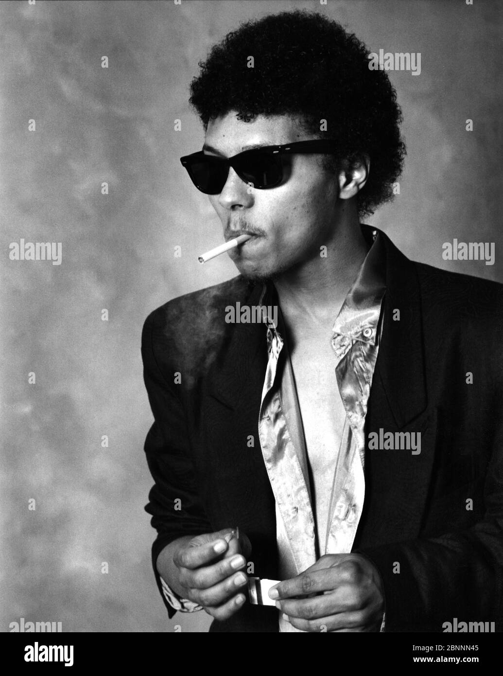 Ritratto in bianco e nero del musicista Ivan Neville della famiglia Neville Brothers di New Orleans Foto Stock