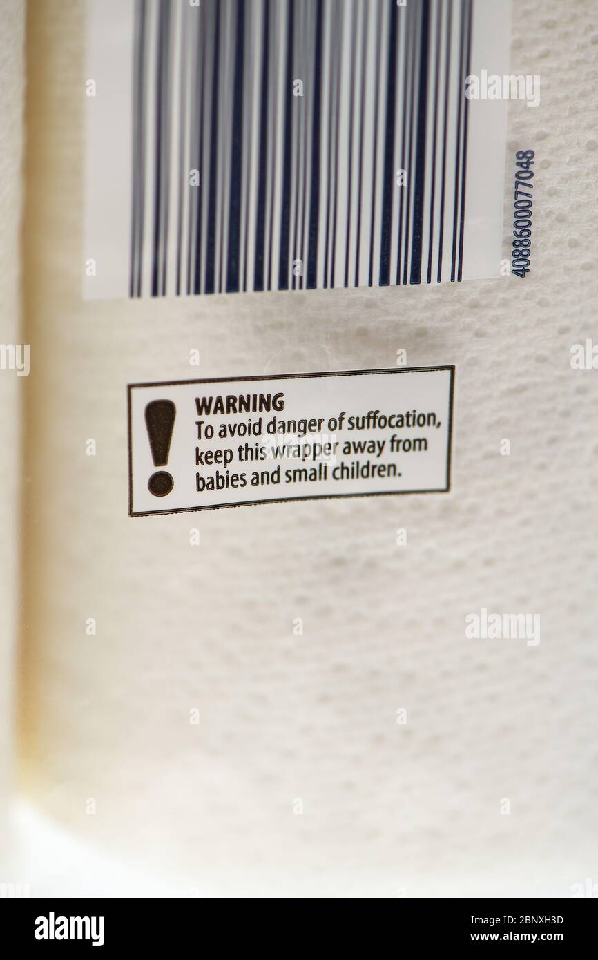 Informazioni sull'imballaggio del sacchetto di plastica avvertenza del rischio di soffocamento. Foto Stock